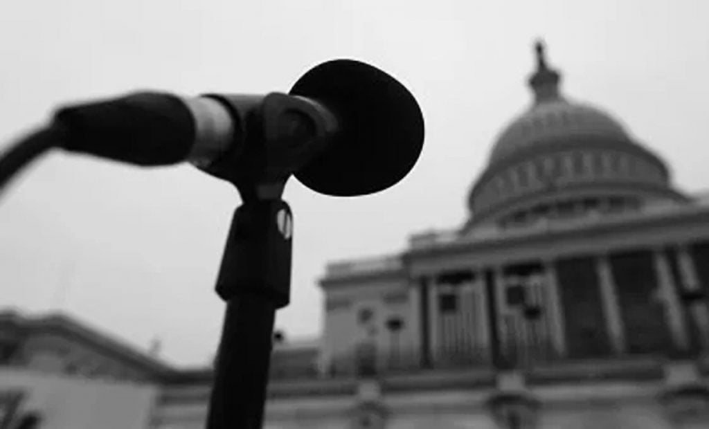 microphone next to capital