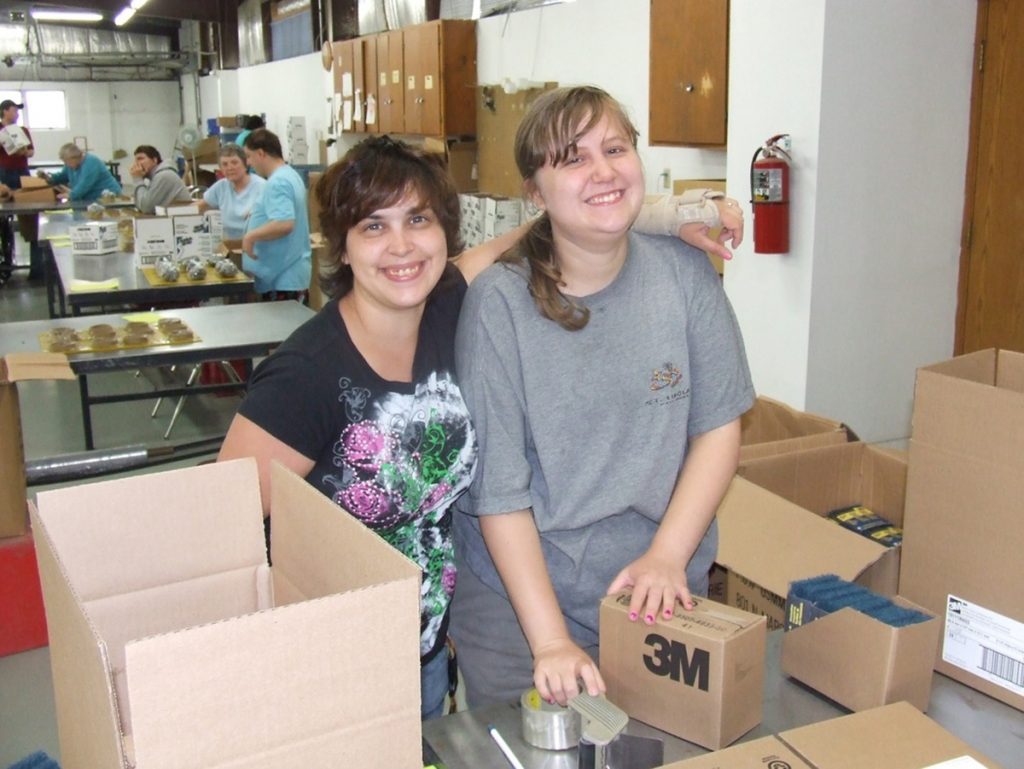 women filling boxes
