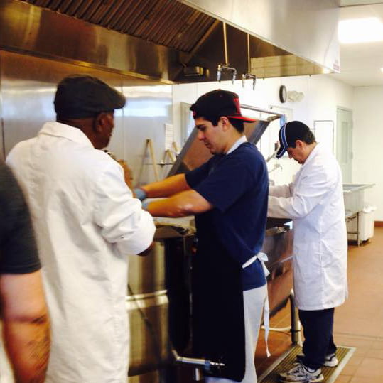 people cooking in a restaurant
