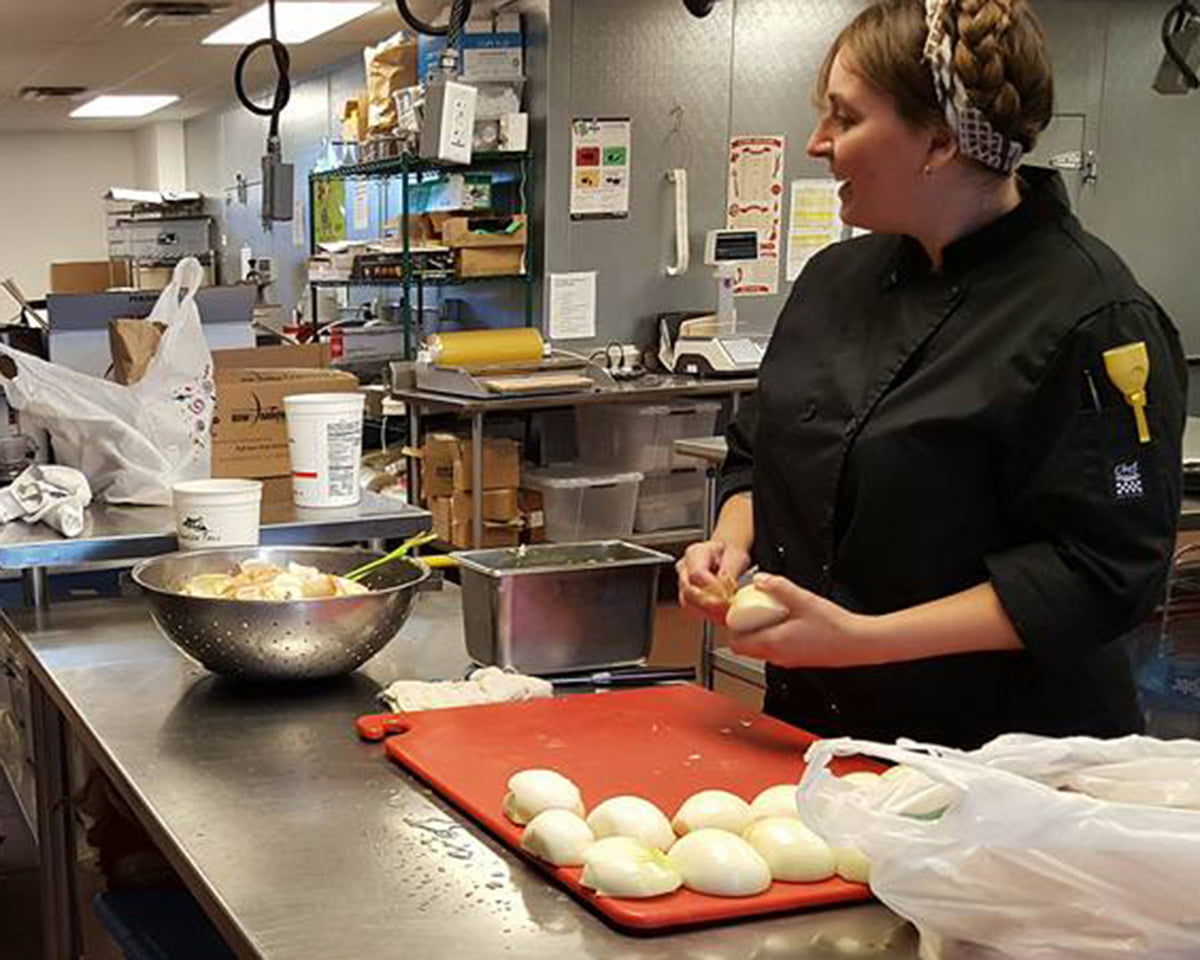 woman making food in a restaurant