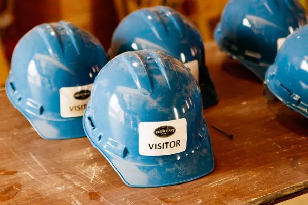 An operation fresh start visitor hard hat